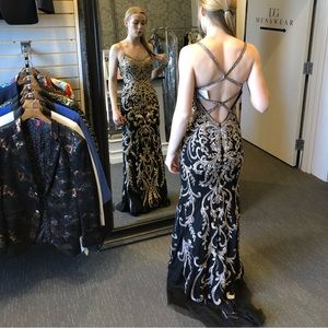 Morilee by Madeline Gardner. Black and Gold detailed dress.